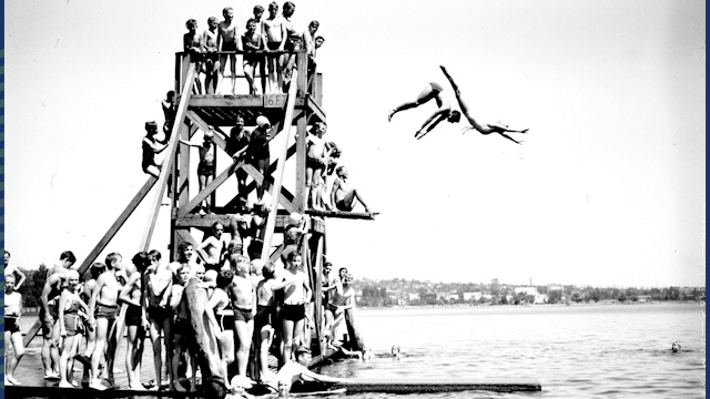 Youth dive into Green Lake