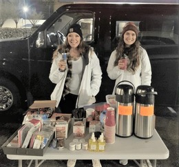 REST’s Outreach Team providing coffee and condoms on Aurora Avenue. Photo provided by REST.