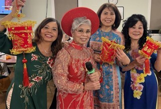 Four Asian/Pacific Islander women elders dressed in traditional clothing to celebrate the Lunar New Year. Photo provided by South Park Senior Citizens