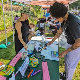 Two people engaging in a discussion about activating Downtown Seattle.