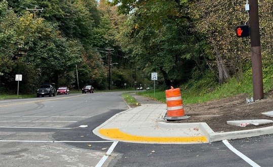 New sidewalk at ADA accessible ramp on the northeast corner of Highland Park Way Southwest and Southwest Holden Street