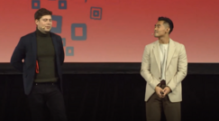 Stig Parfey and Long Dinh presenting on a stage