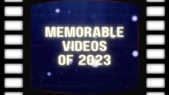 Blue background with black and white film strips on sides, text reads "Memorable Videos of 2023"