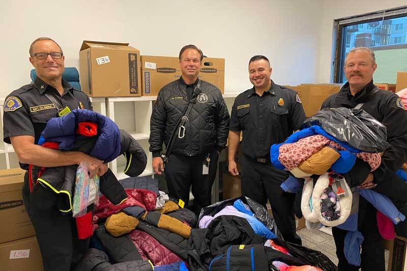 Members of Local 2898 deliver coats to the Children's Home Society in Lake City.
