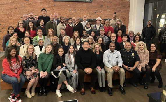 Mayor Harrell and staff members at a holiday dinner.