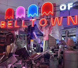 neon ghosts in belltown sign