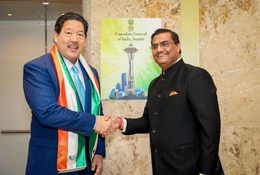 Mayor Harrell shakes hands with Consul General Prakash Gupta