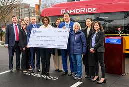 Check presentation to celebrate a Federal Transit Administration grant of $64.2 million towards the RapidRide J Line.