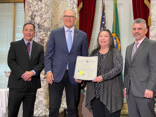 Connie Chin receiving Donnie's Washington State Medal of Valor