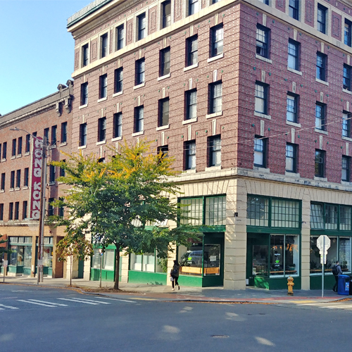 The outside of a brick building in Seattle's Chinatown International District