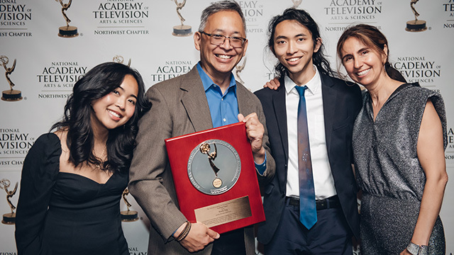 Randy Eng is surrounded by family during the Silver Circle Award Ceremony