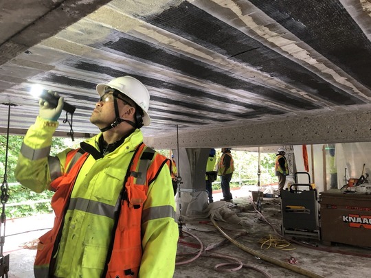 Kit Loo inspects bridge