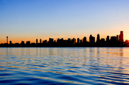 Photo of the Seattle skyline at sunset from the water
