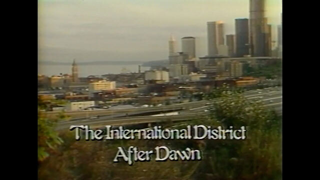 Documentary film cover with aerial view of Seattle, title reads "The International District After Dawn"