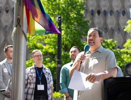 Mayor Harrell raises the Pride flag at City Hall.