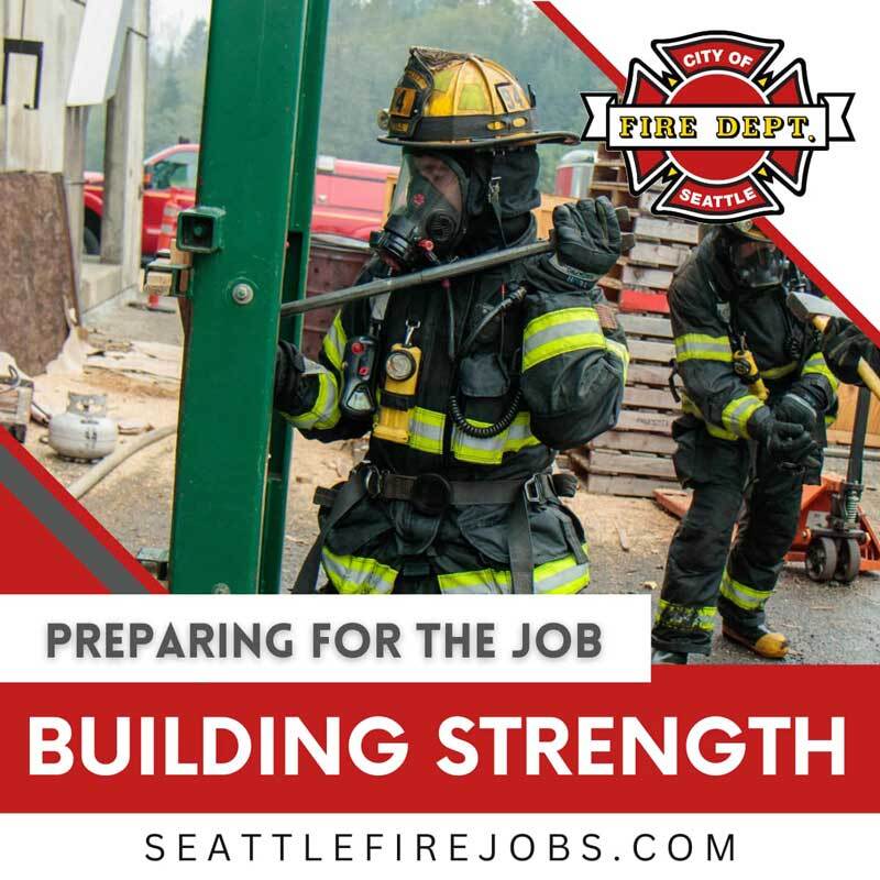 Seattle fire recruits working on forcible entry in drill school