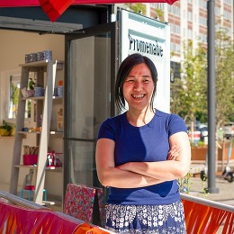 shop owner standing in front of pop up shop