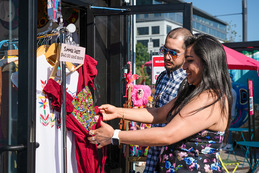 A couple shop the promenade pop-ups