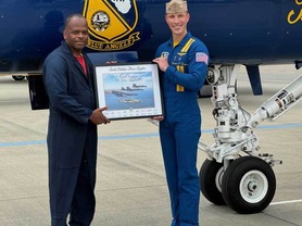 Seattle Fire Chief Scoggins with Navy Lieutenant Conner O'Donnell of the Blue Angels
