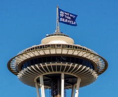 Space Needle flying a We Got This Seattle flag