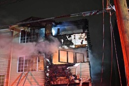 Two-alarm fire in condo buildings in the 8800 block of Nesbit Avenue North, in the Green Lake neighborhood.