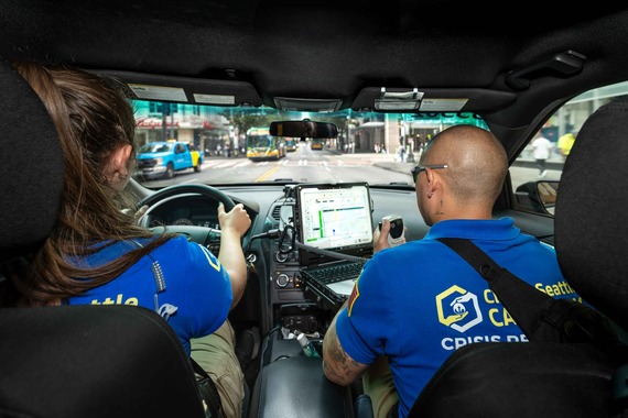 CARE community crisis responders driving in a CARE responder vehicle