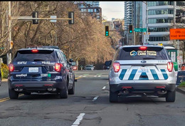 SPD responder vehicle and CARE responder vehicle side by side on road