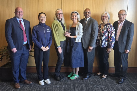 Group of people posing for CDBG award photo