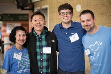 a group of seattle and king county clinic volunteers smiling at the camera