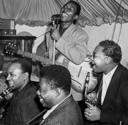 Four musicians jamming together