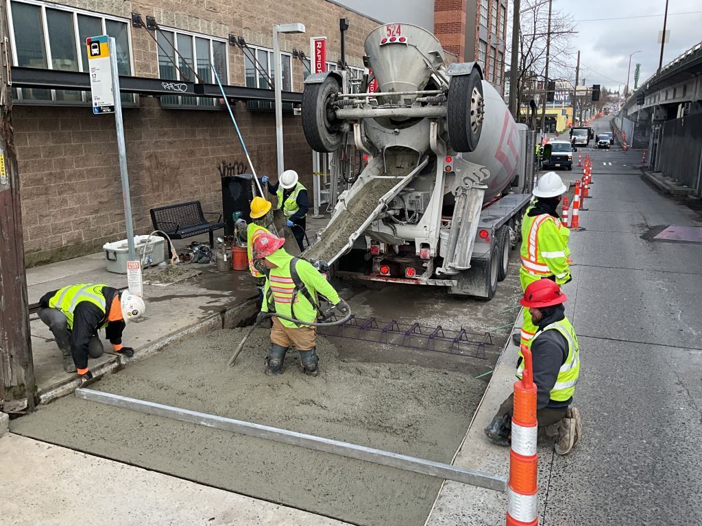 Crews restore roadway pavement on the west side of 15th Ave NW between Leary Way NW and NW Ballard Way