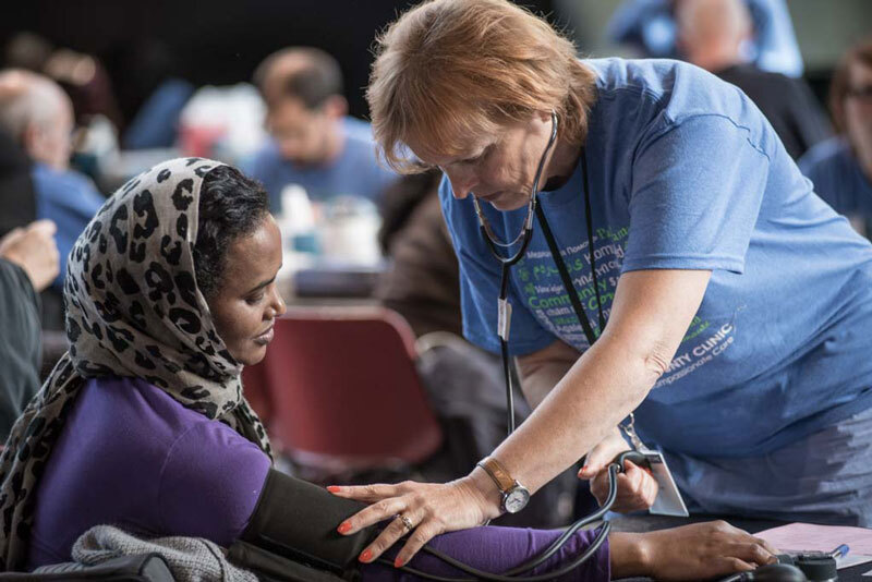 Healthcare provider examining a patient