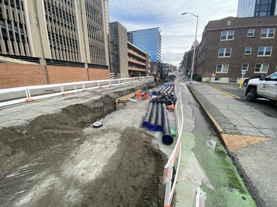 Water main trench and pipes along NE 43rd St 