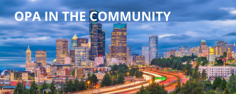 Seattle Downtown Skyline at dusk with text that says OPA in the Community