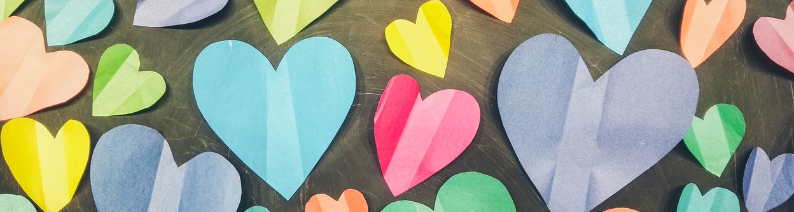 Header of Paper cutout hearts made out of multiple colors