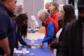 Two women having a conversation at a networking event