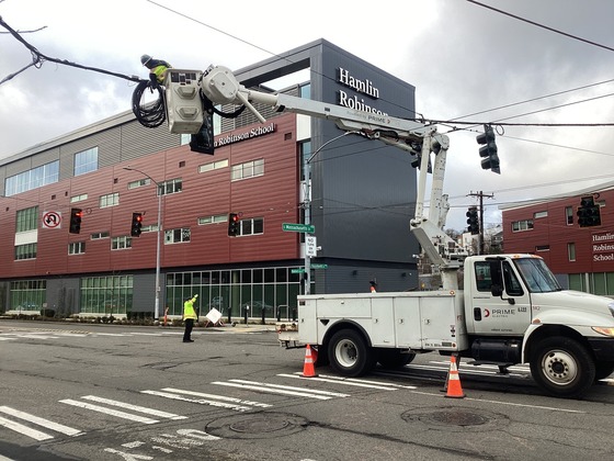 Crews updating signal wiring at Rainier Ave S and S Massachusetts St.