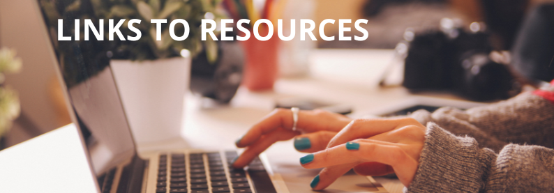 Photograph of a laptop with hands typing on it. The hands have a silver ring and teal blue nail polish on the fingernails.