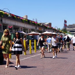 Pedestrians walking though Pike Place Market