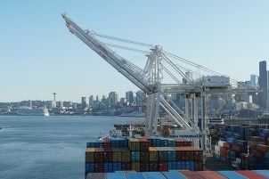 Photo of maritime loading dock with Seattle skyline in the background