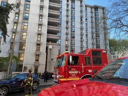 Firefighters responding to a fire in an apartment building.