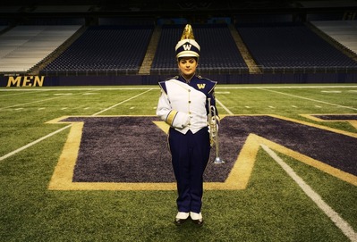 photograph of a woman in a band uniform