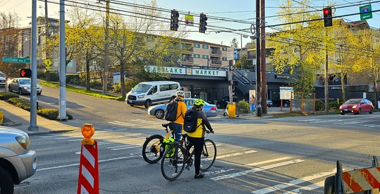 People biking on Eastlake Ave E.