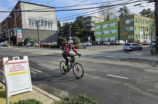 Person biking on Eastlake Ave E. 
