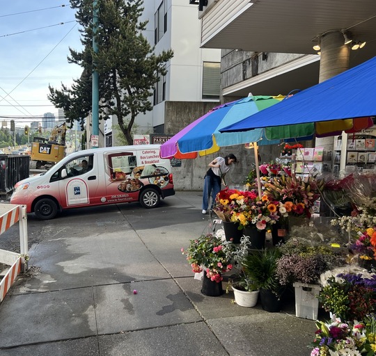 A morning delivery at Le Fournil Bakery and Catering and The Flower Lady.