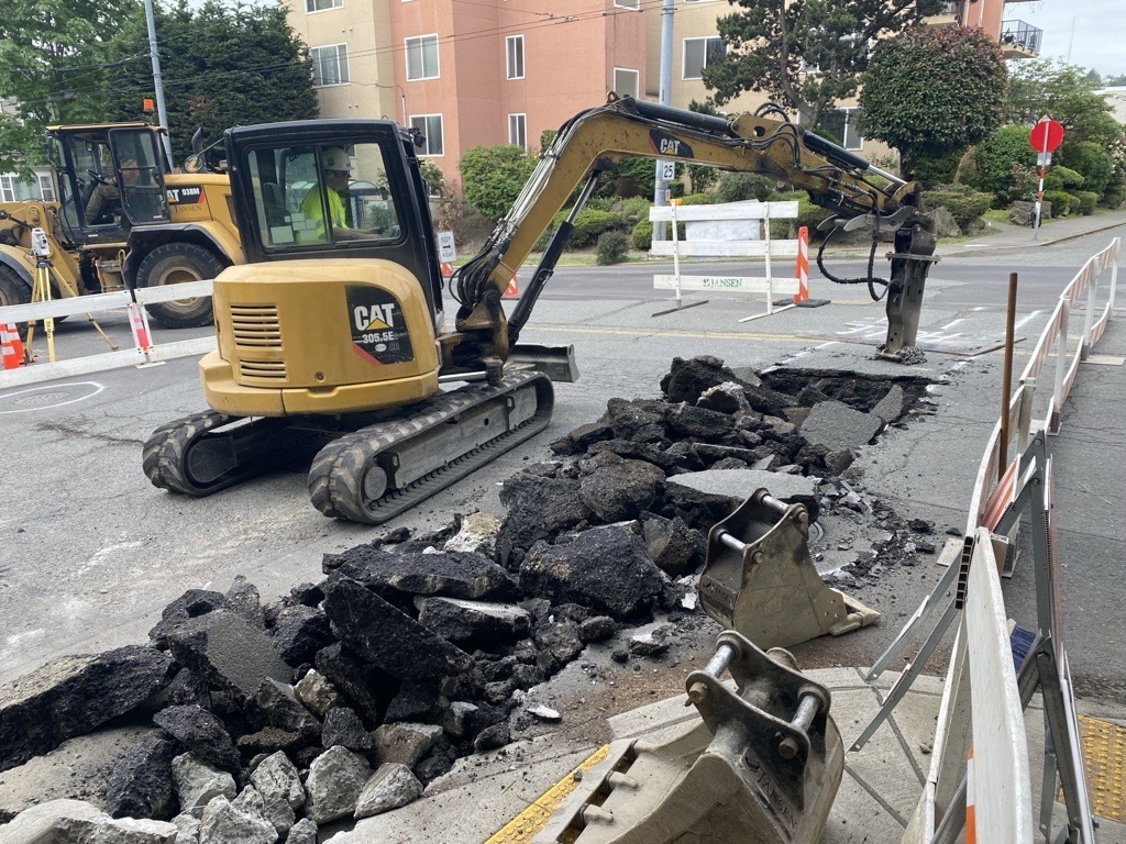 Pavement demolition to replace underground water lines. 