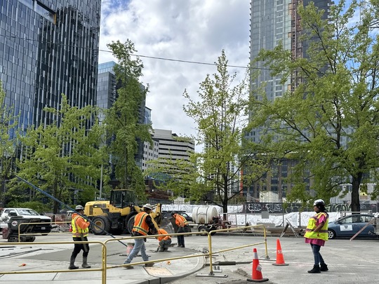 Image showing construction crews working on sidewalk at Denny Way and 8th Ave