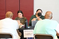 Seattle Municipal Court Staff helping clients with their tickets.