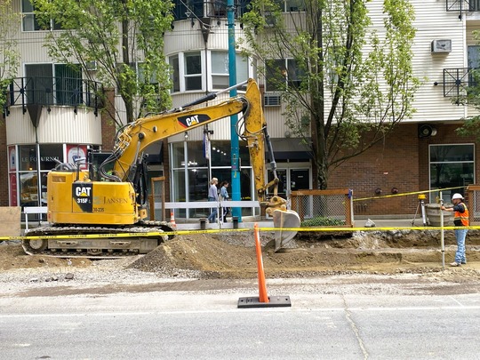Crews prepare the street for new pavement. 