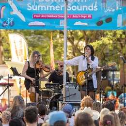 Musicians playing on the Downtown Summer Sounds stage